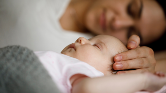 A Friendly Guide to Newborn Sleep: Tips for Keeping Your Sanity One Nap at a Time.  π