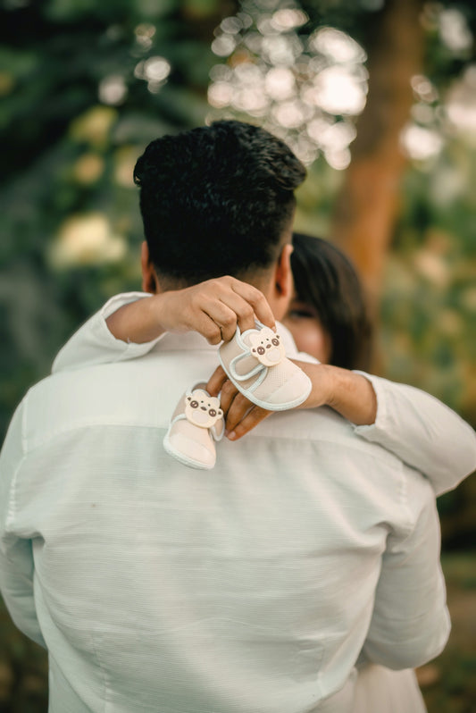 Expecting parents celebrate a new baby.